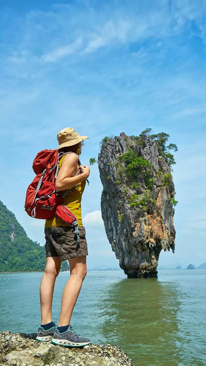 Traveler exploring scenic rock formation